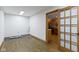 Unfinished laundry room leading into the kitchen area through a doorway at 823 W 200 N, Greenfield, IN 46140