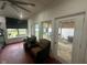 A versatile bonus room that features nice seating and an exit at 9527 Pepperidge Dr, Indianapolis, IN 46235