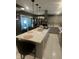 Spacious kitchen featuring a large island, stainless steel appliances, and sleek cabinetry at 9527 Pepperidge Dr, Indianapolis, IN 46235