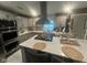 Modern kitchen with stainless appliances, a center island, and custom cabinetry at 9527 Pepperidge Dr, Indianapolis, IN 46235
