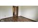 Cozy bedroom featuring hardwood floors and neutral paint tones at 9730 English Oak Pl, Indianapolis, IN 46235