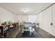 Large basement space with a pool table, wood-framed table, and bright lighting at 976 Santa Maria Dr, Greenwood, IN 46143