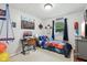 Fun bedroom with a superhero theme, playful decor, and natural light at 976 Santa Maria Dr, Greenwood, IN 46143
