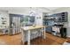 Modern kitchen with a large island, stainless steel appliances, and shaker cabinets at 976 Santa Maria Dr, Greenwood, IN 46143