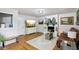 Inviting living room with a decorative fireplace, wood floors, and comfortable seating area at 976 Santa Maria Dr, Greenwood, IN 46143