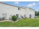 A spacious backyard features a grill, table with chairs, and a well-maintained lawn at 9771 Blue Violet Dr, Noblesville, IN 46060