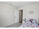 Bright bedroom featuring cozy decor, plush bedding, and a charming 'Be Brave' wall art at 9771 Blue Violet Dr, Noblesville, IN 46060