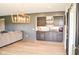Finished basement with a custom wet bar, accent lighting, and a modern chandelier at 987 Oak Terrace Rd, Westfield, IN 46074