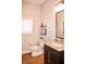 Bathroom featuring a vanity with granite countertop, a toilet, and neutral wall colors providing a clean and modern design at 987 Oak Terrace Rd, Westfield, IN 46074