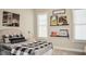 Charming bedroom featuring custom decor above the bed and windows allowing natural light, a cozy and stylish retreat at 987 Oak Terrace Rd, Westfield, IN 46074