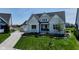 Charming two-story home with a well-kept lawn and inviting front entrance at 987 Oak Terrace Rd, Westfield, IN 46074