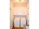 Well-equipped laundry room featuring ample storage cabinets, modern washer, and dryer at 987 Oak Terrace Rd, Westfield, IN 46074