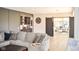 Cozy living room featuring a large sectional sofa and a stylish bar area, creating an inviting and relaxing atmosphere at 987 Oak Terrace Rd, Westfield, IN 46074