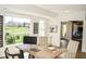 Home office with a view, featuring a large window and stylish furnishings at 987 Oak Terrace Rd, Westfield, IN 46074