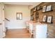 Inviting home office with a wood accent wall, open shelving, and a built-in desk, creating a stylish workspace at 987 Oak Terrace Rd, Westfield, IN 46074