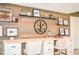 Well-appointed home office featuring a spacious desk area, open shelving, and elegant decor, ideal for remote work at 987 Oak Terrace Rd, Westfield, IN 46074