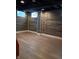 Finished basement features vinyl floors, recessed lights and paneled walls at 1008 E 61St St, Indianapolis, IN 46220