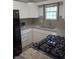 Eat in kitchen with granite countertops and stainless steel appliances at 1008 E 61St St, Indianapolis, IN 46220