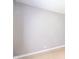 Neutral colored, bright room with a neutral backdrop and wooden floors at 10097 N Balfer E Dr, Fortville, IN 46040