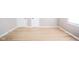 Spacious room with bright wood floors and fresh paint with bright white trim at 10097 N Balfer E Dr, Fortville, IN 46040