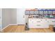 Well-lit work area with a convenient entrance and organized storage solutions at 10097 N Balfer E Dr, Fortville, IN 46040