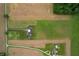 View of property featuring a home, outbuilding, a long driveway, and surrounding fields at 10274 S 400 W, Pendleton, IN 46064