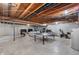 Spacious basement featuring recreational area with ping pong table, TV area, and exercise equipment at 10274 S 400 W, Pendleton, IN 46064
