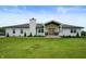 Charming front view of a painted brick home with a covered porch and manicured landscaping at 10274 S 400 W, Pendleton, IN 46064