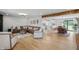 Open-concept living room flows into the kitchen and dining area, with ample seating at 10274 S 400 W, Pendleton, IN 46064