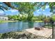 This home offers a scenic pond view and brick firepit area in the backyard at 10560 Lighthouse Way, Indianapolis, IN 46256