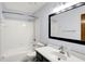 Well-lit bathroom featuring a vanity, shower, tub and framed mirror at 10560 Lighthouse Way, Indianapolis, IN 46256