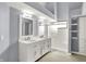 Contemporary bathroom featuring a double vanity, shower, and storage at 10560 Lighthouse Way, Indianapolis, IN 46256