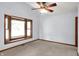 This bedroom features a bright bay window and neutral tones at 10560 Lighthouse Way, Indianapolis, IN 46256