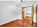 Spacious bedroom featuring wood floors, neutral paint and adjoining room at 10560 Lighthouse Way, Indianapolis, IN 46256