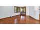 Dining area featuring hardwood floors, natural light, and access to the outdoor area at 10560 Lighthouse Way, Indianapolis, IN 46256