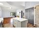 Bright and airy kitchen with a large island, hardwood floors, and modern cabinets at 10560 Lighthouse Way, Indianapolis, IN 46256