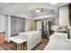 Bright kitchen with stainless steel appliances, stylish cabinets and countertops, and a large island at 10560 Lighthouse Way, Indianapolis, IN 46256