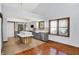 Bright kitchen with island, stainless steel appliances, and hardwood floors at 10560 Lighthouse Way, Indianapolis, IN 46256