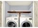 Cozy laundry room with modern washer and dryer units at 10560 Lighthouse Way, Indianapolis, IN 46256