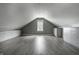 Spacious finished attic space with great storage and neutral decor is ready for new uses at 10833 Marquette Rd, Zionsville, IN 46077