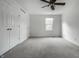 Spacious bedroom with neutral carpet and large closet is ready for new occupants! at 10833 Marquette Rd, Zionsville, IN 46077