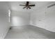 The light and bright bedroom features fresh paint, a fan, and plush carpeting at 10833 Marquette Rd, Zionsville, IN 46077