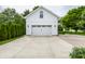 Detached two car garage has plenty of parking and storage options for new homeowners at 10833 Marquette Rd, Zionsville, IN 46077