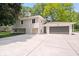 Charming two-story home with a spacious driveway and attached two-car garage at 11123 Haverstick Rd, Carmel, IN 46033