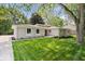 Well-maintained single-story home with a neatly manicured lawn and inviting curb appeal at 11123 Haverstick Rd, Carmel, IN 46033