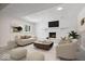 Cozy living room features a fireplace and neutral decor at 11123 Haverstick Rd, Carmel, IN 46033