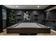 The basement offers an entertaining area with a pool table and curated decor at 11552 Buckskin Dr, Zionsville, IN 46077