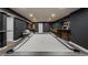 This spacious finished basement includes a pool table, wet bar and ample room for entertaining and recreation at 11552 Buckskin Dr, Zionsville, IN 46077