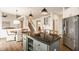 Bright open kitchen features a large island and stainless steel appliances at 11552 Buckskin Dr, Zionsville, IN 46077