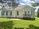 Large backyard with newly seeded lawn and a small deck at , Noblesville, IN 46060